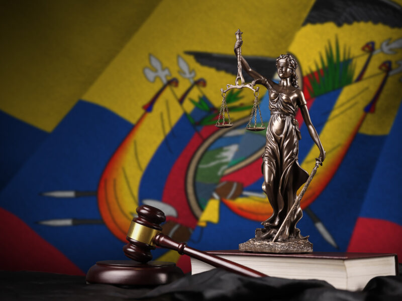 ecuador flag with statue lady justice constitution judge hammer black drapery concept judgement guilt