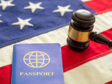 blue passport law gavel usa flag background close up view