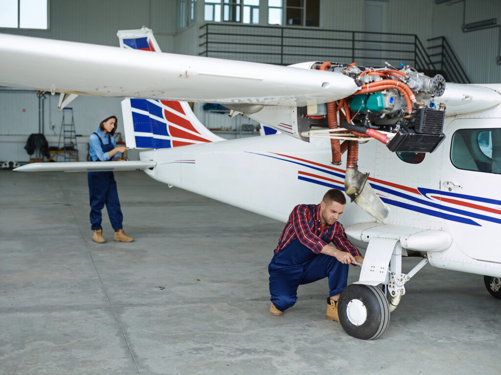 engineers working with airplane 1
