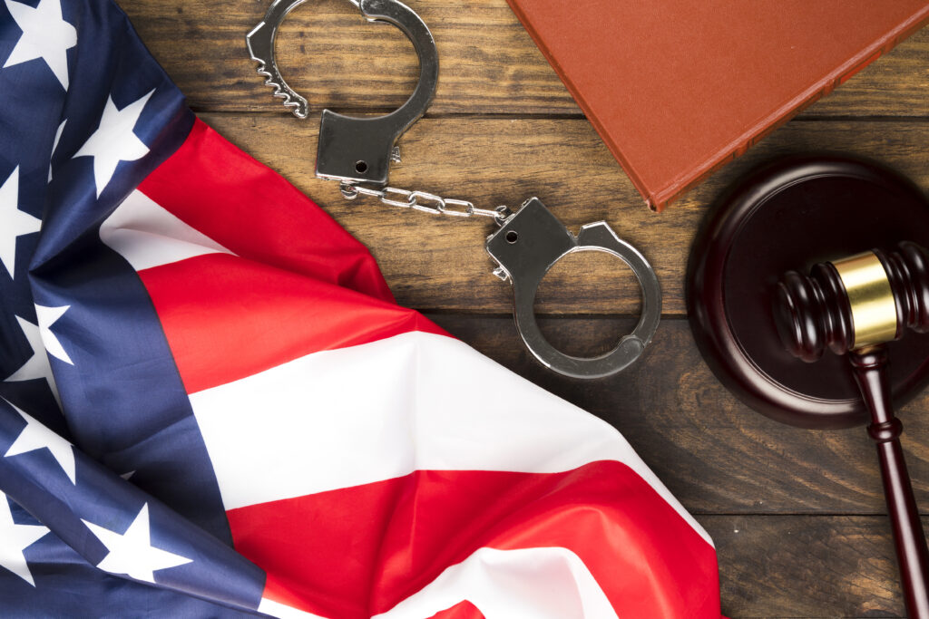 top view american flag with handcuffs gavel 1